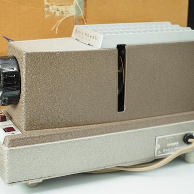 Lot 102  Bell and Howell Slide headliner 707 projector