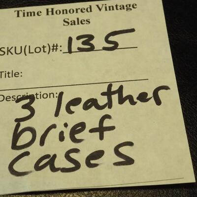 Lot 135- Three vintage brief cases