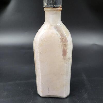 AT & SF ANTIQUE MEDICINE GLASS BOTTLRN