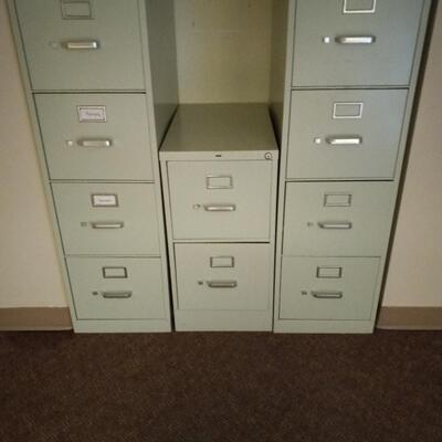 THREE METAL FILE CABINETS