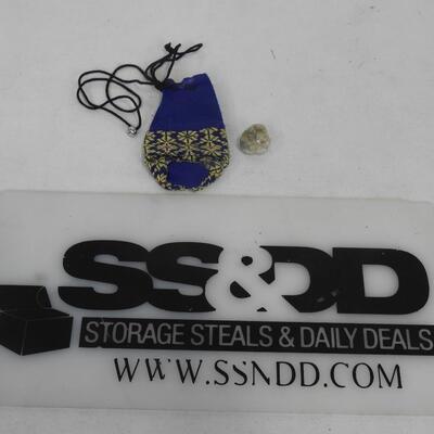 Stone with Blue Pouch. Possible Raw Gemstone