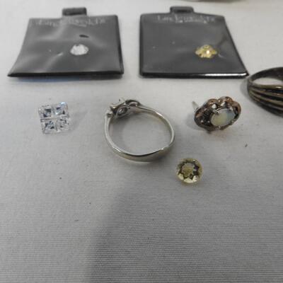Jewelry: 2 Sterling Silver Rings,Opal Earring,Costume Ring,1 Zirconia+4 unknown