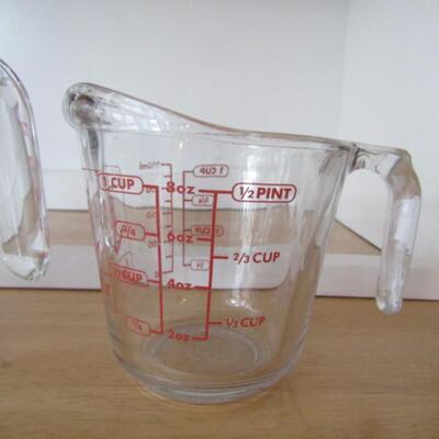 Three Glass Measuring Cups- Pyrex: Quart and Pint Sizes.  Anchor Hocking: Half Pint Size