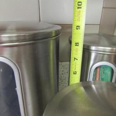 Three Stainless Steel Canisters