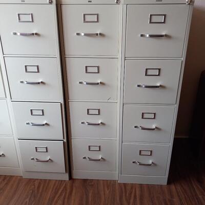 LOT 83T THREE HON METAL FILE CABINETS