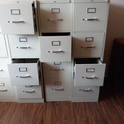 LOT 83T THREE HON METAL FILE CABINETS