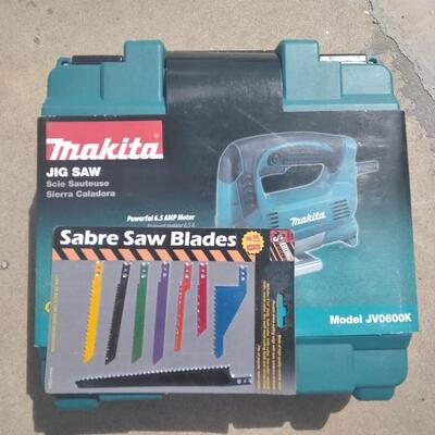 LOT 100 MAKITA JIG SAW WITH BLADES