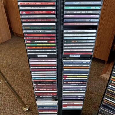 TWO CD TOWER HOLDERS AND CDS