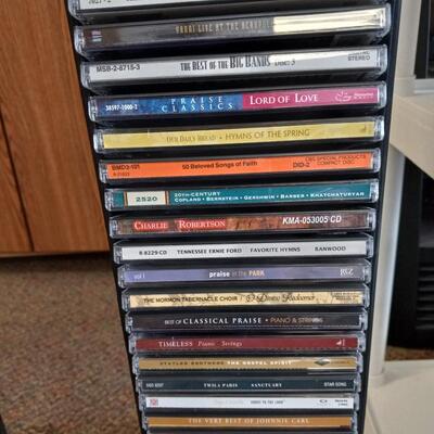 TWO CD TOWER HOLDERS AND CDS