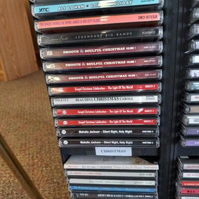 TWO CD TOWER HOLDERS AND CDS