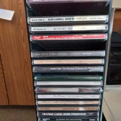 TWO CD TOWER HOLDERS AND CDS