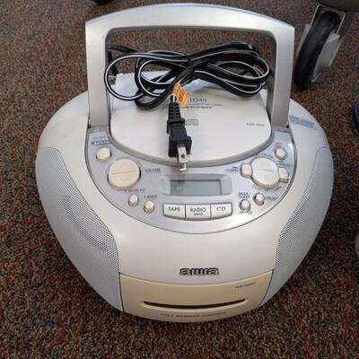 VINTAGE HEATER AND PORTABLE CD PLAYER
