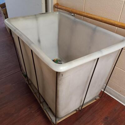 WHITE PLASTIC CART ON CASTERS