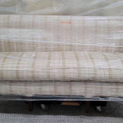 Cream and tan leather stripe settee $1190