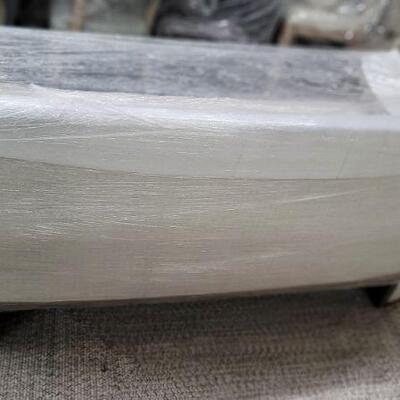 Tufted modern rounded sofa with metal details $1980 H32"  WW77"  D37"