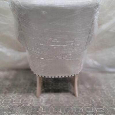 Wing chair back view H44. W33. D35