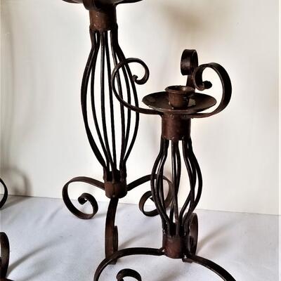 Lot #47  Set of 4 Wrought Iron Candle Sticks