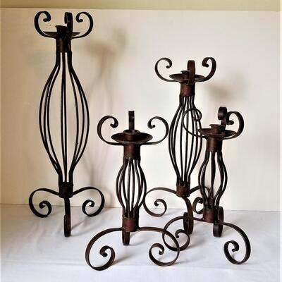 Lot #47  Set of 4 Wrought Iron Candle Sticks