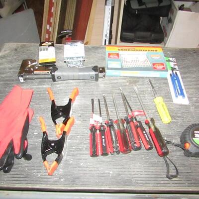 LOT 40  SCREWDRIVER SETS, SPRING CLAMPS, STAPLER AND MORE