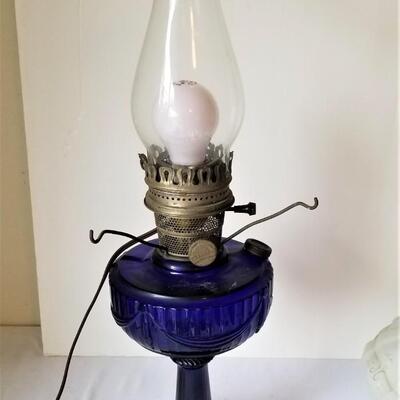 Lot #52  Antique Alladin Oil Lamp, now electrified