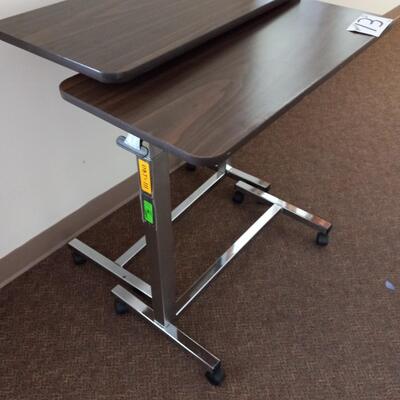 LOT 13C  TWO ROLLING TABLES ON CASTORS