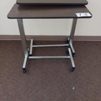 LOT 13C  TWO ROLLING TABLES ON CASTORS
