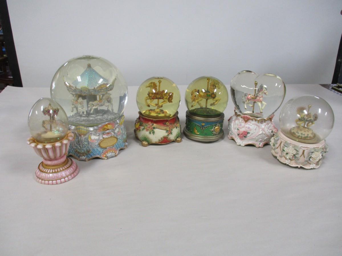 Collection Of Carousel Horse Themed Snow Globes | EstateSales.org