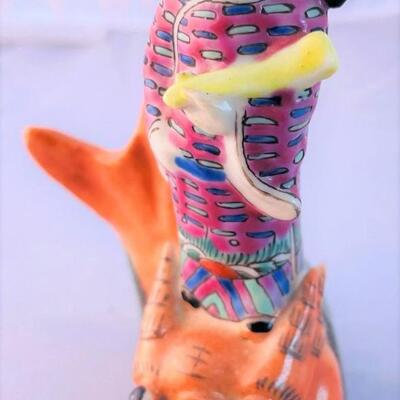 Antique Chinese Figure Riding a Dragon