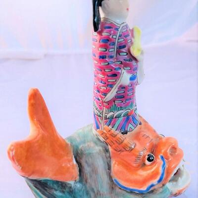Antique Chinese Figure Riding a Dragon