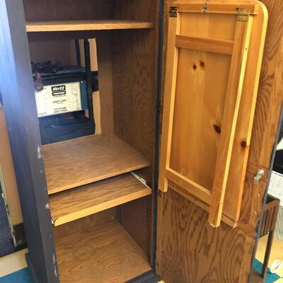 Furniture: Tall wooden cabinet, pull out drawer for keyboard, fold down table for additional work space.;26.5x22.25 x 68