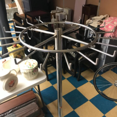 display fixtures:1 silver, metal, purse rack, large round base;60" tall x 19" diameter