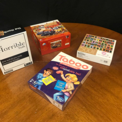 Games:lot adult oriented games and puzzles- 2 puzzles, 2 games;