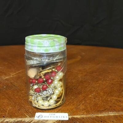 Jewelry / Crafting:1 jar of assorted jewelry;