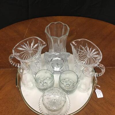 glass / crystal:lot heavy round marble tray, 2 water pitchers, vase, clock, 2 rocks glasses, 1 bowl with raised dotted edge, 2 juice...