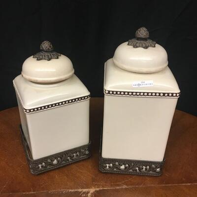decor: 2 large canister like vases with metal perch;