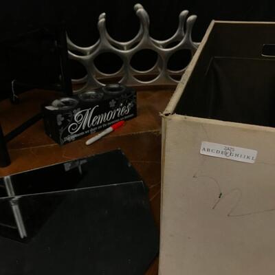 decor: 3 space candle holder, small table decorative mirrors quantity 2, wire basket, wine rack;