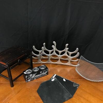 decor: 3 space candle holder, small table decorative mirrors quantity 2, wire basket, wine rack;