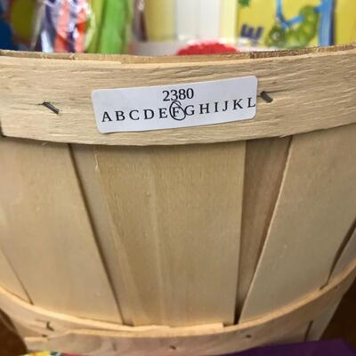 crafts: paint brushes, letter sticker, markers,glue sticks, gel crayons, butterfly box, and more in basket;