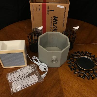 Decor: letter board, decorative mirror,planter,candle holders;