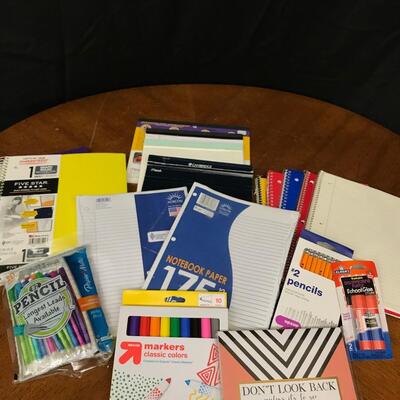 office/school supplies: packs of filler paper, notebook paper,glue sticks, pencils,pens;