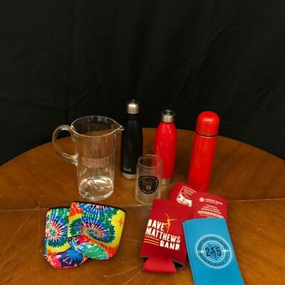 kitchen: pitcher, water bottles, various can coolers, glass;