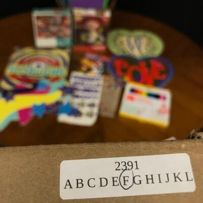 crafts: signage, craft paper, puzzles, letter stickers,markers, comics;
