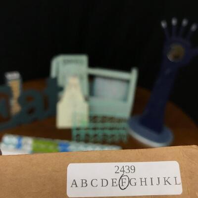 decor: all seeing hand jewelry holder, eat sign, shelf paper/contact paper, wire holder, wooden box, jenga, snowman decor;