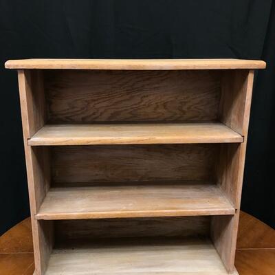 furniture: small bookcase;
