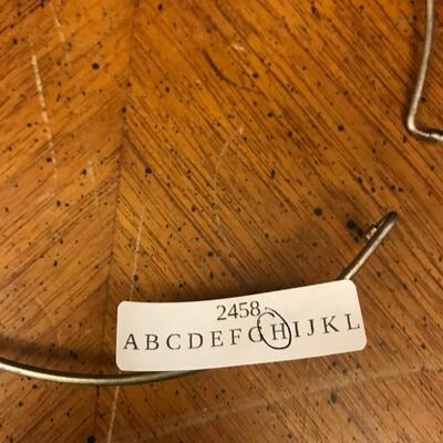 jewelry: 3 metallic choker style necklace;