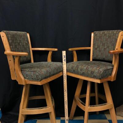furniture: 2 swiveled wooden/cloth bar stools with footrest;