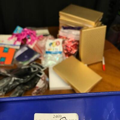 party supplies: gift boxes, happy birthday banner, gift bags, gift wrap materials;