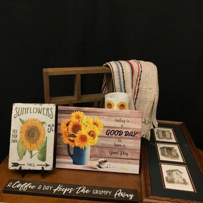 decor: sunflower lot with wall decor and rug;
