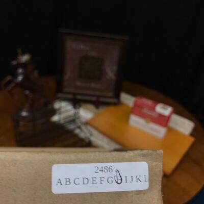 decor: Ceramic unicorn, shelf, campbell's recipe collection, rug, cutting board;
