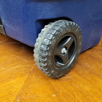 :1 Coleman Blue cooler, white lid on wheels;